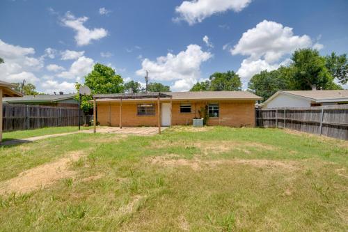 a house with a fence in a yard at Pet-Friendly Sachse Home Large Fenced Yard in Sachse