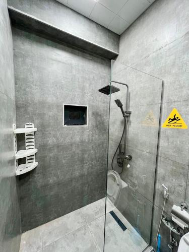 a bathroom with a shower and a toilet in it at AZ Villa in Gabala in Gabala