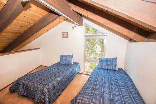 En eller flere senge i et værelse på Villas # 78 By Hauserman Rentals