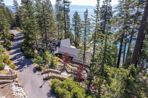 an aerial view of a house in the woods at McCown Lakefront By Hauserman Rentals in Tahoma
