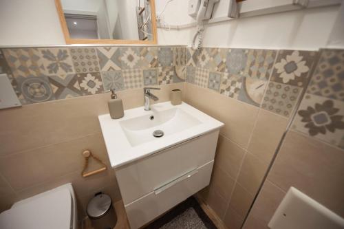 Koupelna v ubytování Holiday House Annunziata 1