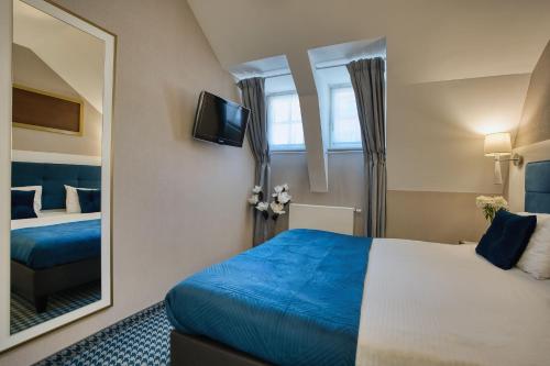Hotel Villa Art Novis City Centerにあるベッド