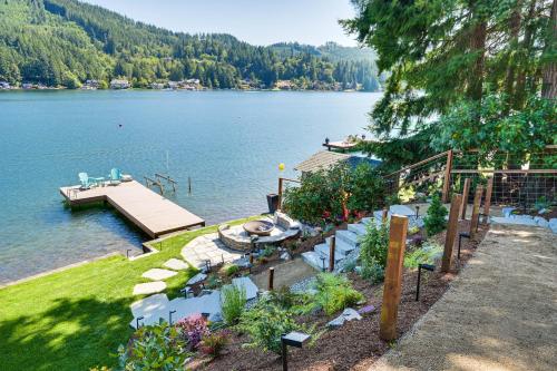 an aerial view of a lake with a dock at Modern Summit Lake Escape - Spacious Deck with View! in Kamilche
