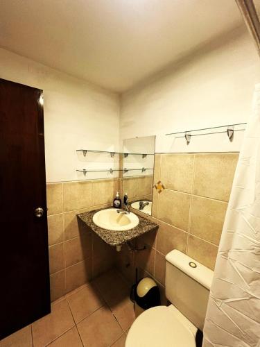 Ванная комната в Apartamento hermoso Cine Center