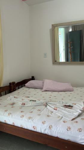 Postel nebo postele na pokoji v ubytování Suite do farol 2