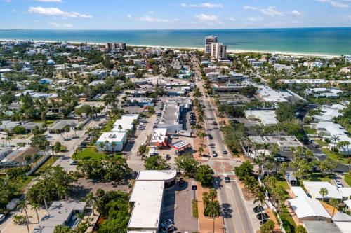 an aerial view of a city with the ocean at Heat of Siesta Village Walk to Beach w heated Pool in Siesta Key