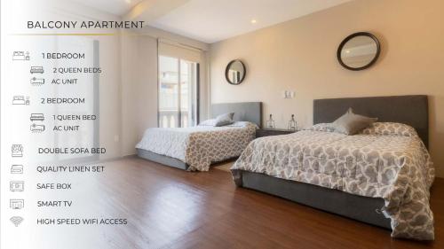 a bedroom with two beds and a mirror on the wall at 406 Location 2Bdrm 2baths AC Rooftop in Mexico City