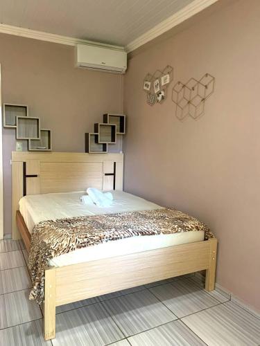 a bedroom with a bed in a room at Casa dei Nonni in Garibaldi