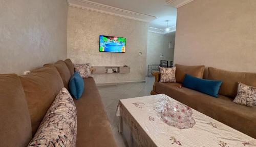 TV a/nebo společenská místnost v ubytování Serenity Apartment