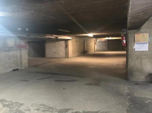 an empty parking lot in a parking garage at Red Flat Paris in Paris