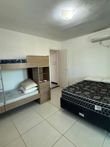 Postel nebo postele na pokoji v ubytování Escarpas do lago vista privilegiada