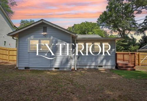 a house with the word mentor painted on the side of it at Marietta Charmer in Marietta