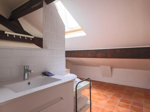 a bathroom with a sink and a skylight at House with garden 4BR 10P near Paris in Le Kremlin-Bicêtre