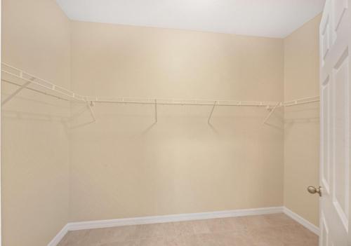 a room with a closet with white walls at Serenity Escape in Palm Coast