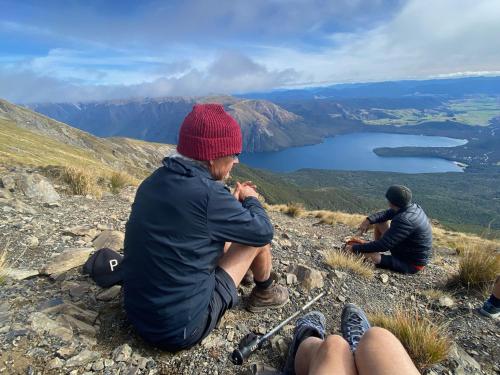 a group of people sitting on top of a mountain at River Road Retreat in Redwoods Valley