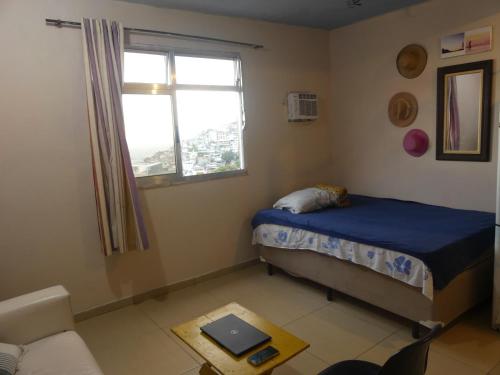 Postel nebo postele na pokoji v ubytování Casa de Férias Carioca