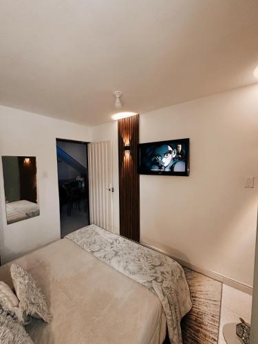 Voodi või voodid majutusasutuse Aquí, cada rincón te abraza, punto céntrico en la ciudad toas