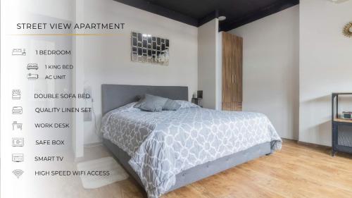 a bedroom with a bed in a white room at 506 Great Location AC 1Bdrm 1bath apt Rooftop in Mexico City