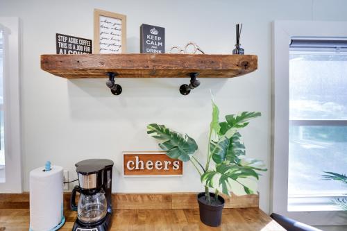 a wooden clipboard hanging on a wall in a kitchen at 2 Bedroom Condo in Tannersville - 6 Minutes from Camelback Mountain in Tannersville