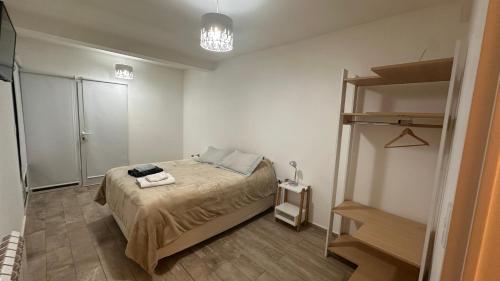 Ένα ή περισσότερα κρεβάτια σε δωμάτιο στο Duplex Jardines del Rey