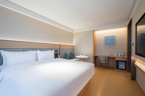 JI Hotel Beijing Xizhimen Jiaotong Universityにあるベッド
