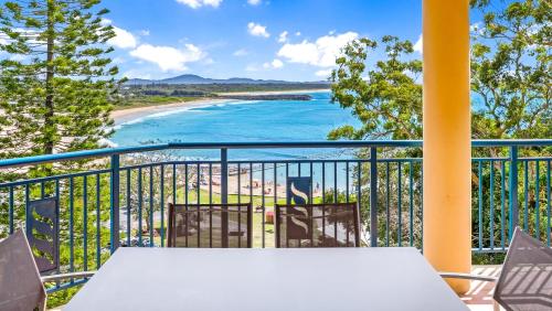 a balcony with a view of a beach at Whitesands 501 in Forster
