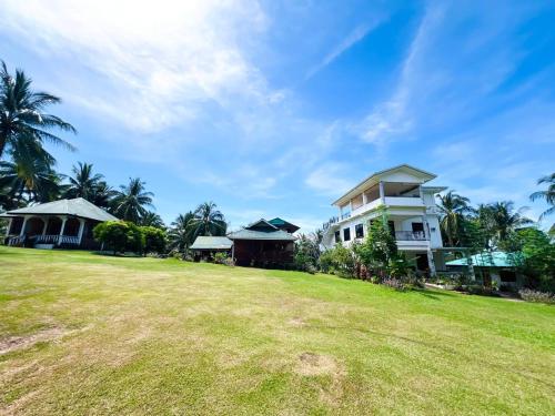 Κήπος έξω από το Taylor Plantacion Resort - Bamboo Villa