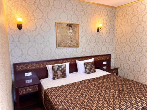 Katil atau katil-katil dalam bilik di Odeska Astoria Arcadia Hotel
