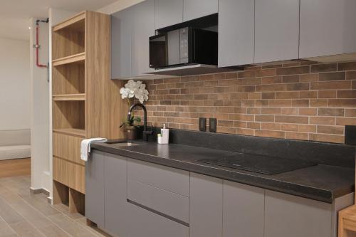 Kuchyň nebo kuchyňský kout v ubytování Marsellesa