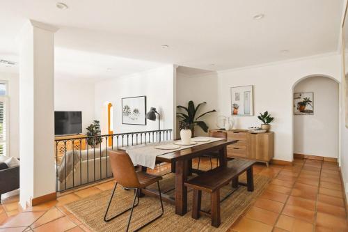 a dining room with a table and chairs at Coastal Retreat-Spacious 4BR Walk to Beach in Perth