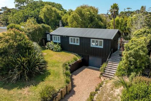 Κήπος έξω από το Tahatai Cottage