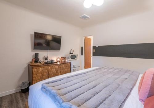 Postel nebo postele na pokoji v ubytování b side motel