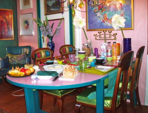 a blue table with food on it in a room at Annehelenes B&B in Bergen