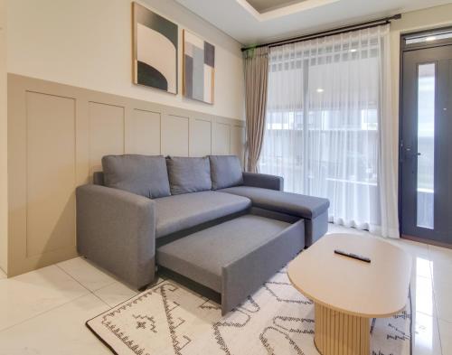 Χώρος καθιστικού στο 3BR Villa Punawangi With Jacuzzi