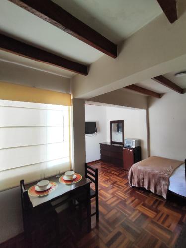 Ένα ή περισσότερα κρεβάτια σε δωμάτιο στο Amplia habitación independiente Larcomar