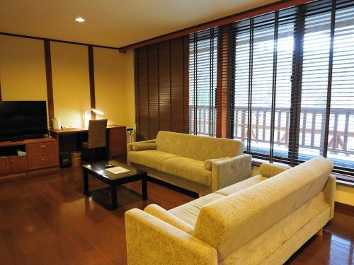 トムラウシ温泉東大雪荘にあるテレビまたはエンターテインメントセンター