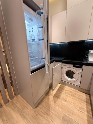 Køkken eller tekøkken på Polo Residences