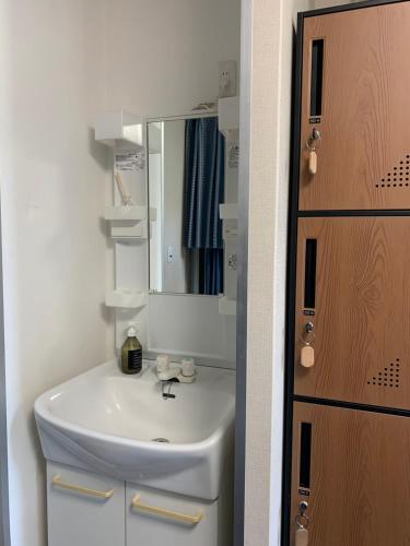 Bilik mandi di Fukuoka Tabiji Hostel & Guesthouse