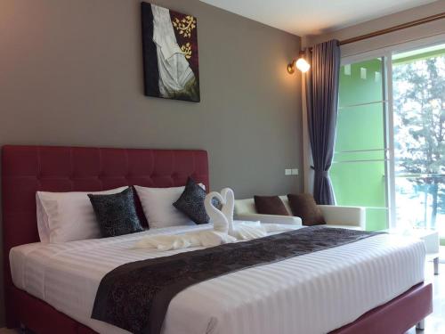 Postel nebo postele na pokoji v ubytování Greenseaview Resort