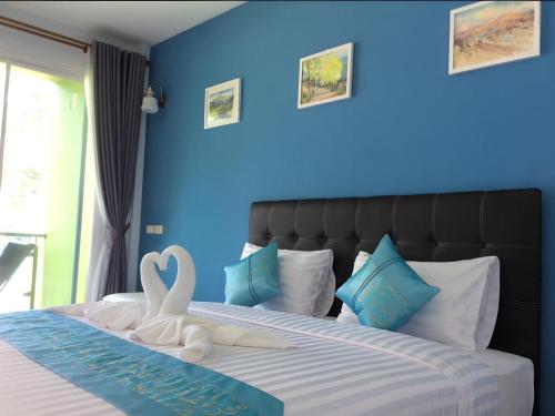 Postel nebo postele na pokoji v ubytování Greenseaview Resort