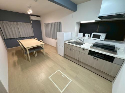 Una cocina o cocineta en EASE-Takasaki-Yawata