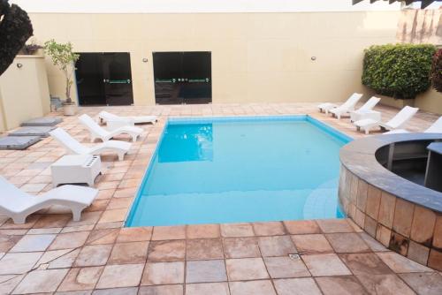 Bazén v ubytování Minas Palace Hotel nebo v jeho okolí
