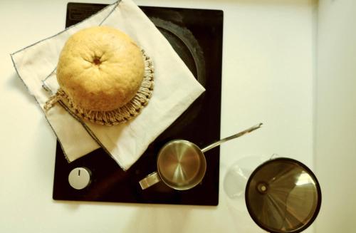 a painting of a cake on top of a table at Pyoseon Mansion in Seogwipo