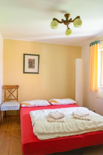 Ένα ή περισσότερα κρεβάτια σε δωμάτιο στο Ferienhaus Unter den Eschen