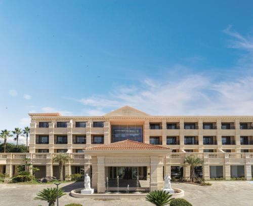 a large office building with a large building at The Siena PRIMO in Seogwipo