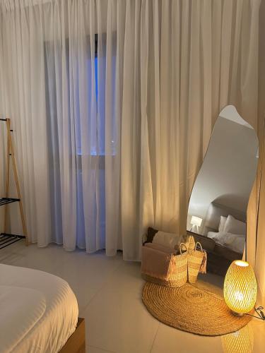 Postel nebo postele na pokoji v ubytování Boulevard Flat