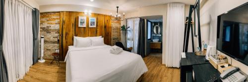 Cama o camas de una habitación en Petite Dalat - Boutique Hotel