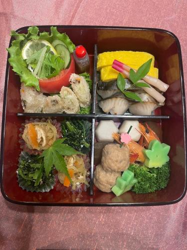 a plastic container filled with different types of food at 蒼々さぬき志度 SOUSOU Sanuki Shido in Sanuki