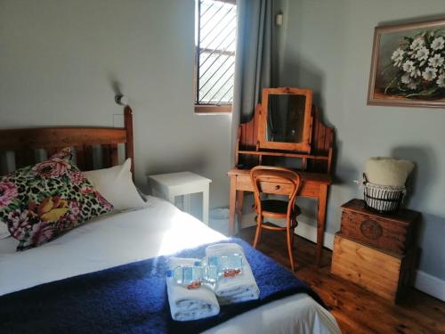 Postel nebo postele na pokoji v ubytování Die Tuis Huis Selfcatering NO LOADSHEDDING
