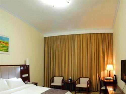 Cama o camas de una habitación en Nanning Yongzhou Hotel